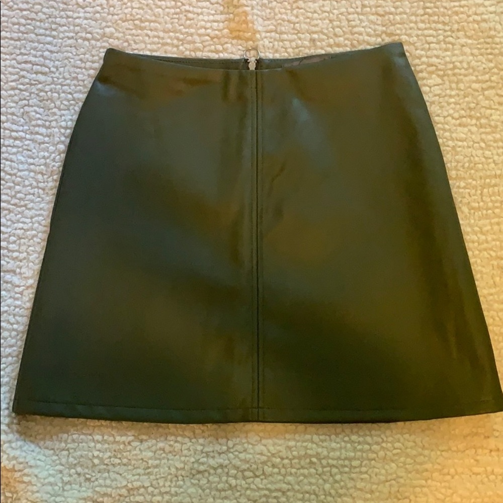 New. Never worn. Faux leather skater skirt.